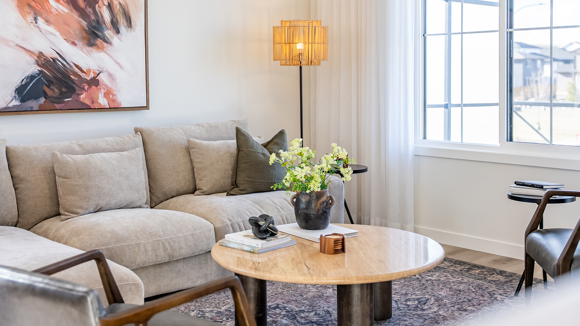 Open-concept living room in the Douglas model by StreetSide Calgary featuring modern finishes, ample natural light, and comfortable gathering space.