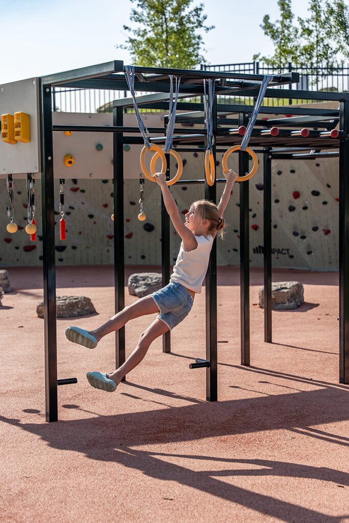 Generating response Copilot said: Little child enjoying the playground at Harmony Adventure Park, featuring modern play structures, outdoor recreation space, and family-friendly amenities within the Harmony community.